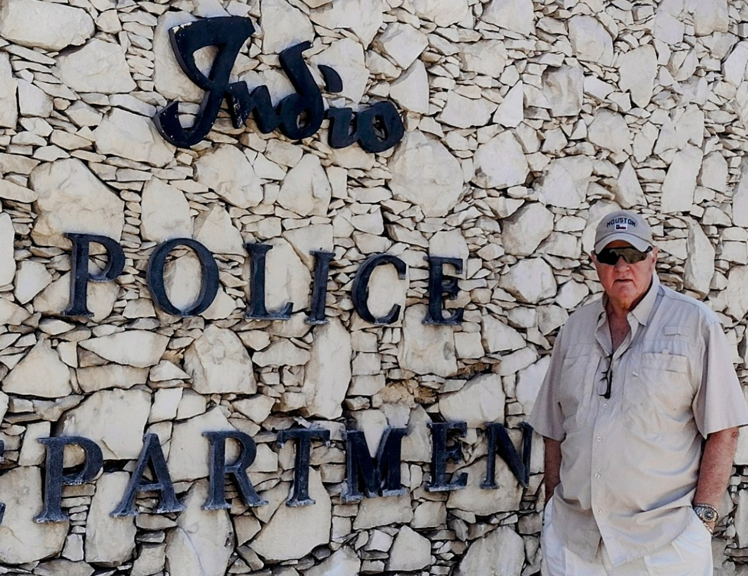 A person standing in front of a sign
AI-generated content may be incorrect.