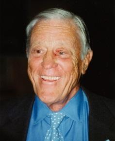 A close-up of a person smiling
Description automatically generated