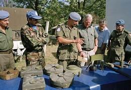 A group of men in military uniforms
Description automatically generated