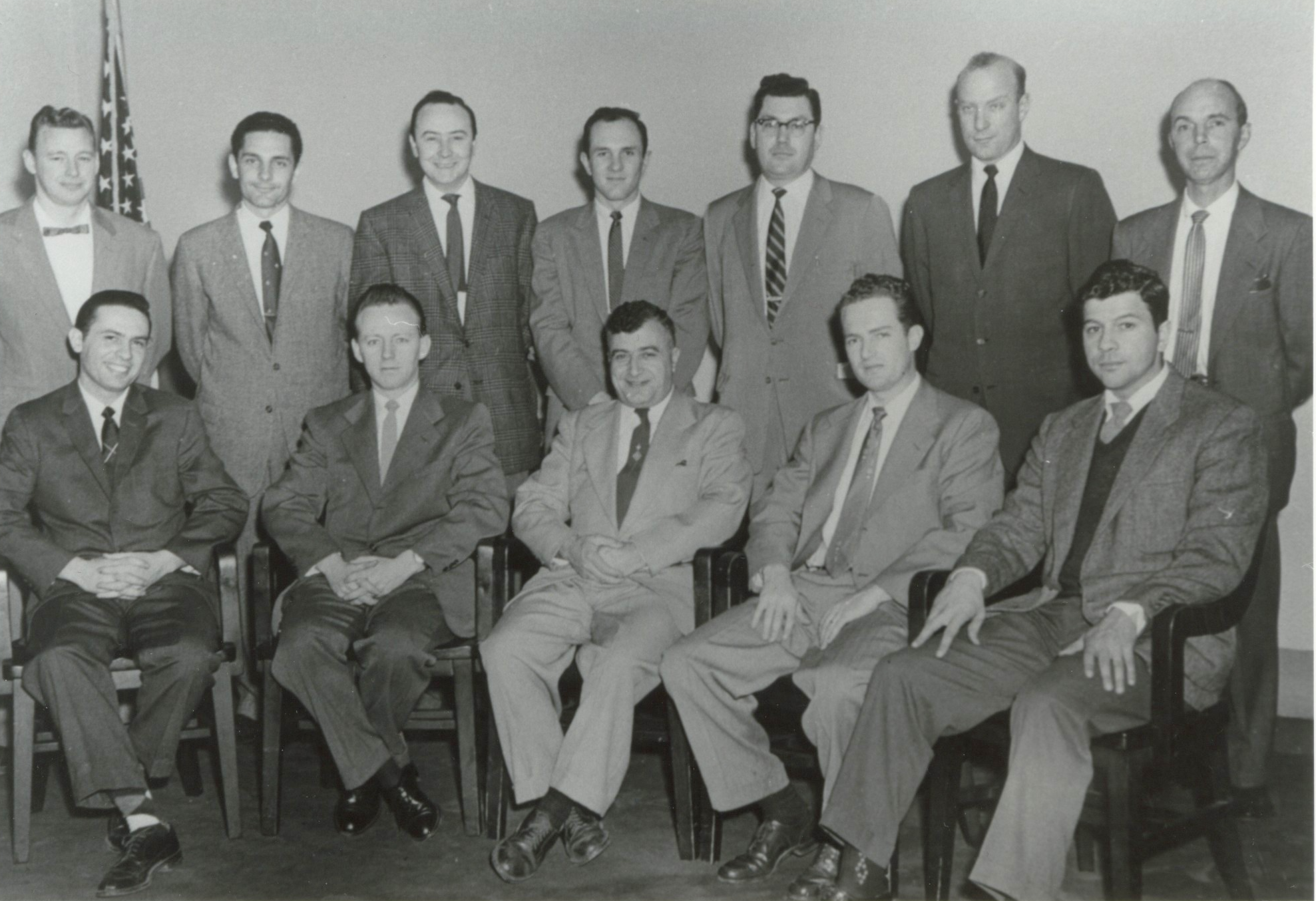 A group of men in suits

AI-generated content may be incorrect.
