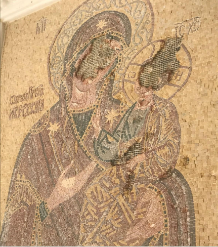A mosaic of a person and child

AI-generated content may be incorrect.