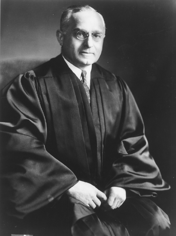 A person in a black robe
AI-generated content may be incorrect.