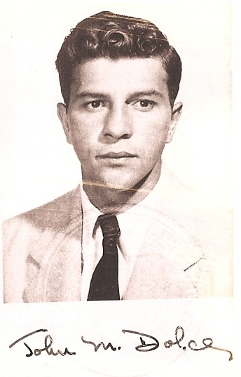 A person in a suit and tie

AI-generated content may be incorrect.