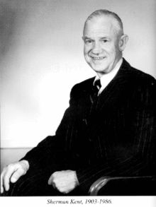 A person in a suit smiling

AI-generated content may be incorrect.