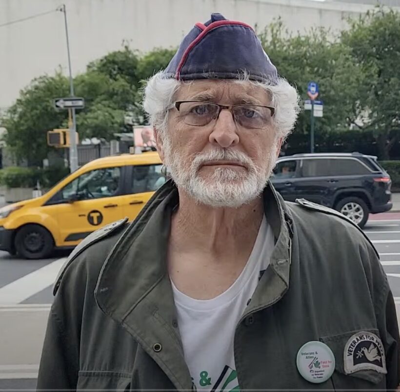 A person with a hat and glasses

AI-generated content may be incorrect.