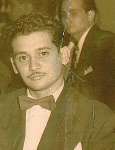 A person with a mustache and bow tie

AI-generated content may be incorrect.