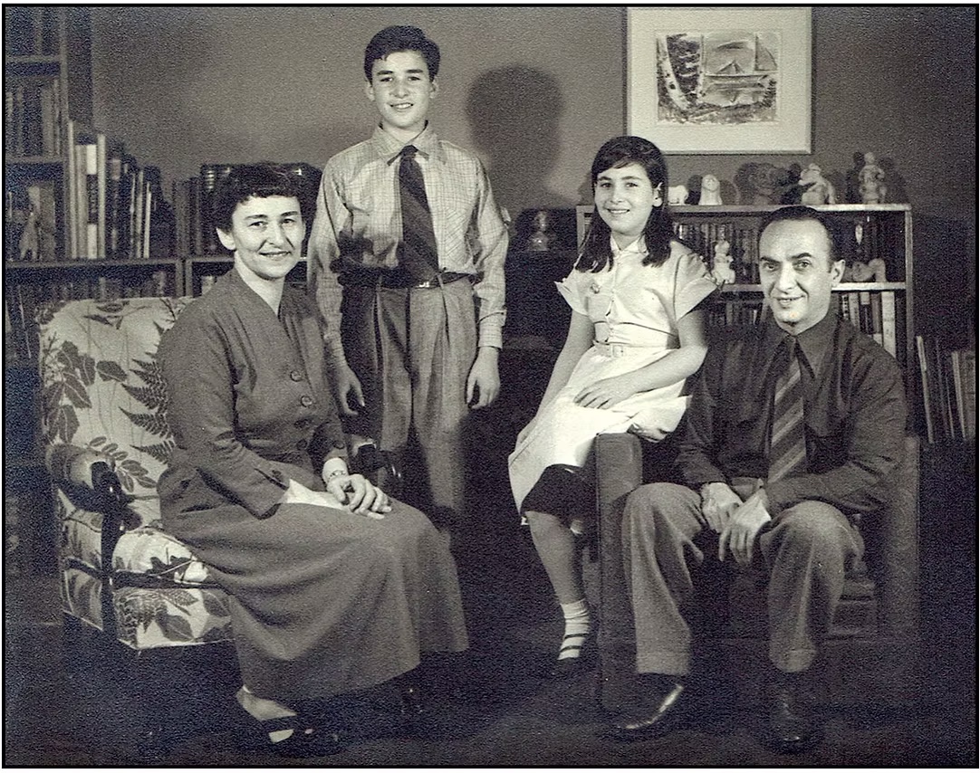A family posing for a photo
AI-generated content may be incorrect.