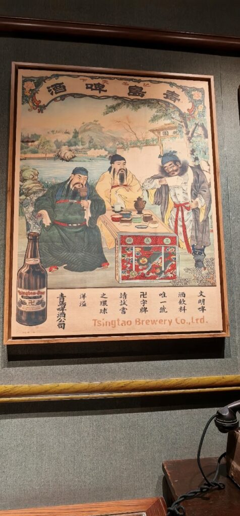 A framed picture of men sitting at a table

AI-generated content may be incorrect.