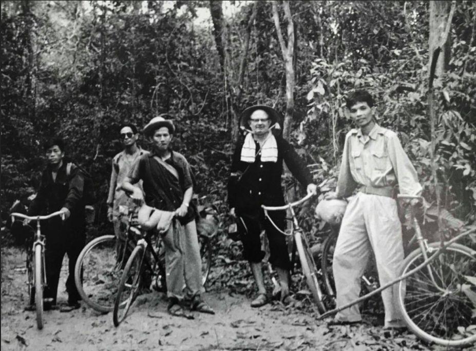 A group of people standing next to bicycles
AI-generated content may be incorrect.