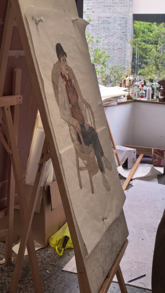 A painting on a easel

AI-generated content may be incorrect.