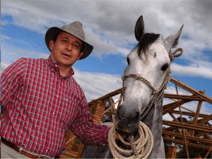 A person holding a rope on a horse AI-generated content may be incorrect.