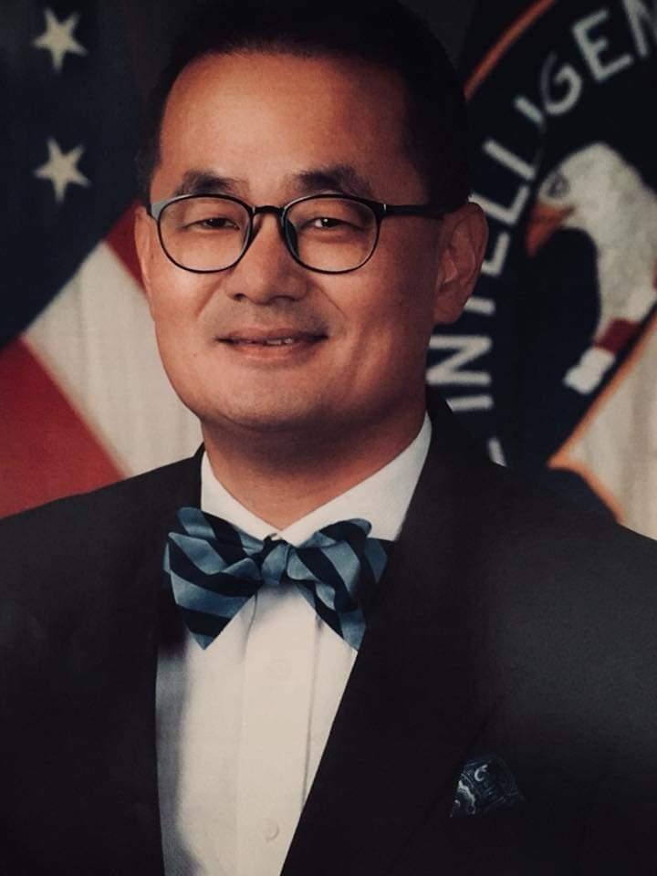 A person in a suit and bow tie
AI-generated content may be incorrect.
