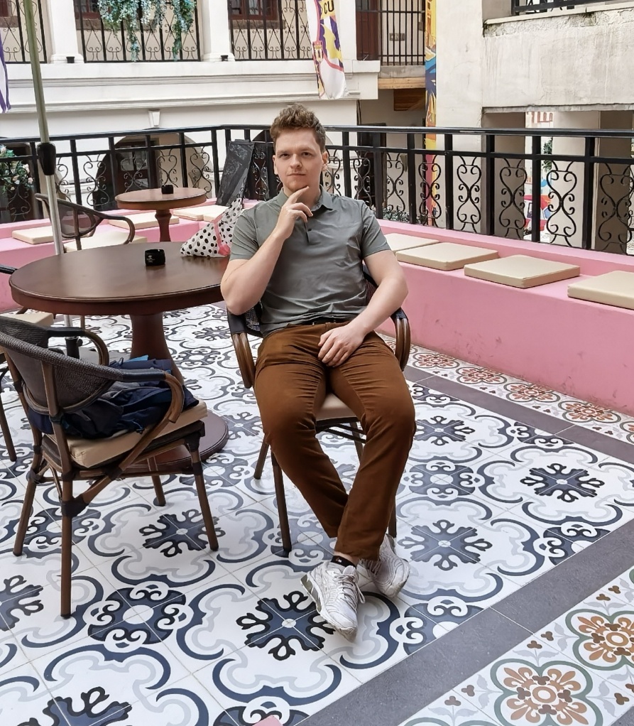 A person sitting in a chair

AI-generated content may be incorrect.