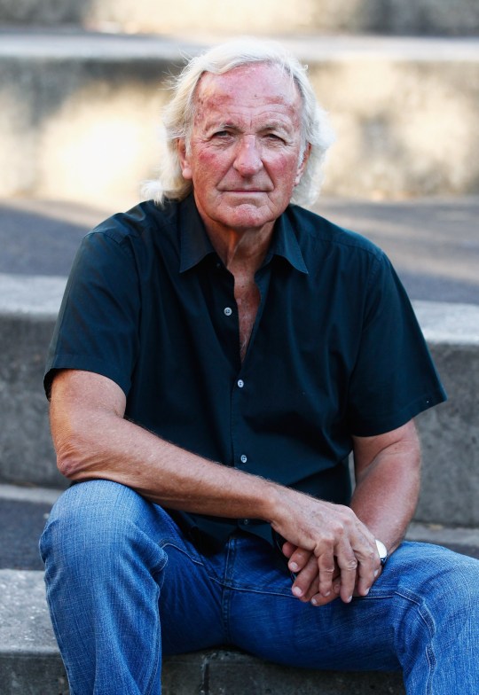 A person sitting on a stone steps

AI-generated content may be incorrect.
