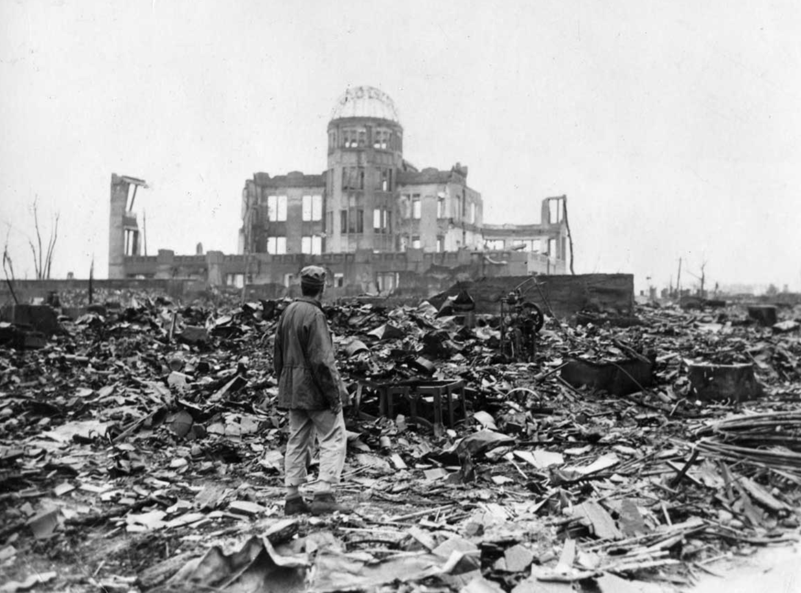 A person standing in front of a destroyed building

AI-generated content may be incorrect.
