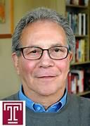 A person wearing glasses and a blue shirt
AI-generated content may be incorrect.