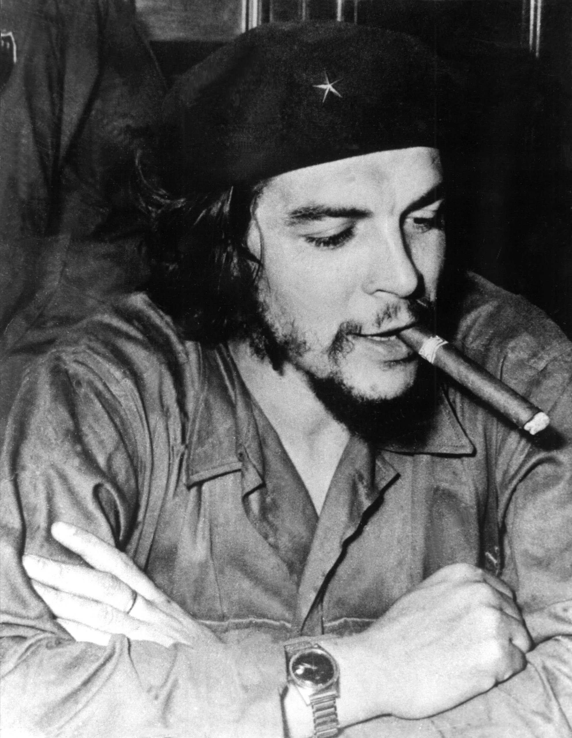 A person with a cigar in his mouth
AI-generated content may be incorrect.