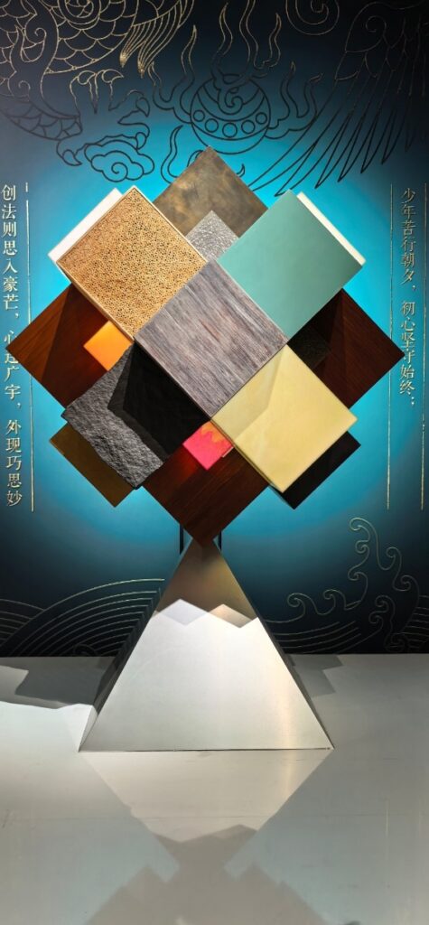 A sculpture of various colored squares

AI-generated content may be incorrect.