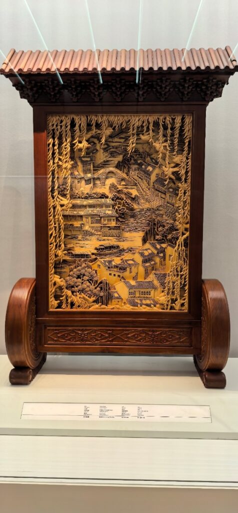 A wood and metal screen

AI-generated content may be incorrect.