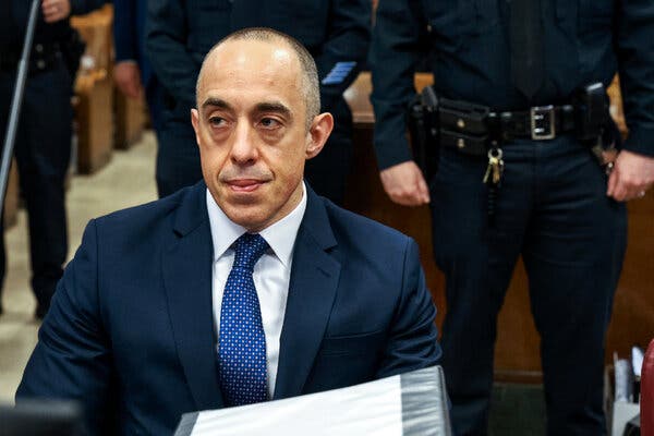 Emil Bove III sitting in a courtroom.