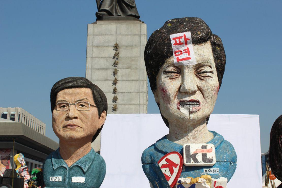 Sculptures depicting ousted South Korean President Park Geun-hye and acting President Hwang Kyo-ahn at a protest camp on Gwanghwamun Square.