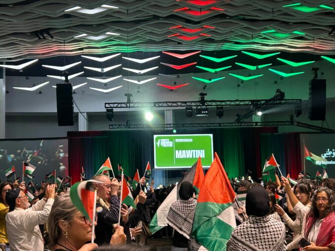 A group of people holding flags

AI-generated content may be incorrect.