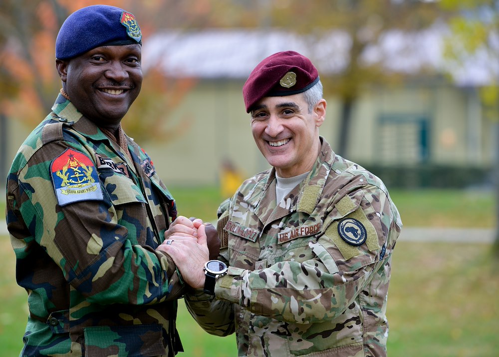 A group of soldiers shaking hands

AI-generated content may be incorrect.