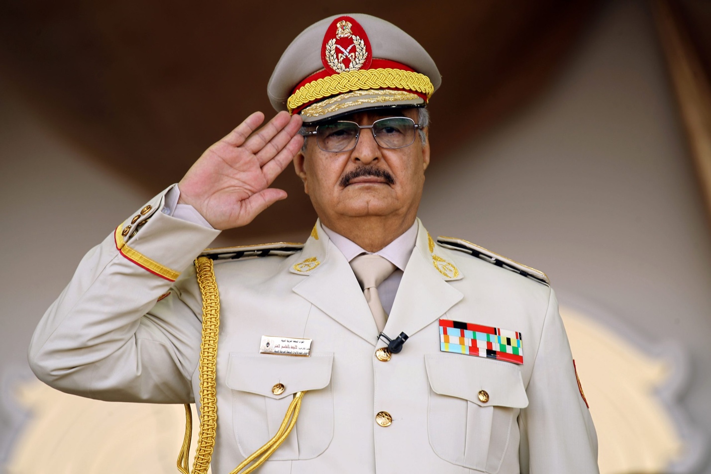 A person in a military uniform saluting
AI-generated content may be incorrect.