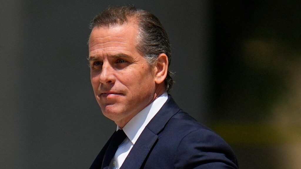 A person in a suit

AI-generated content may be incorrect.