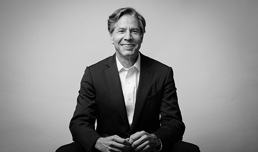 A person in a suit

AI-generated content may be incorrect.