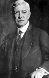 A person in a suit and tie

AI-generated content may be incorrect.