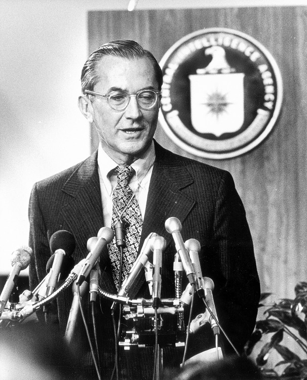 A person standing at a podium with microphones

AI-generated content may be incorrect.
