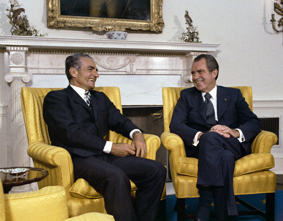 A few men sitting in yellow chairs
AI-generated content may be incorrect.