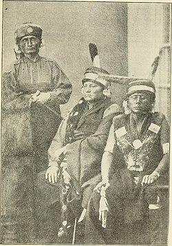 A group of people in traditional clothing
AI-generated content may be incorrect.