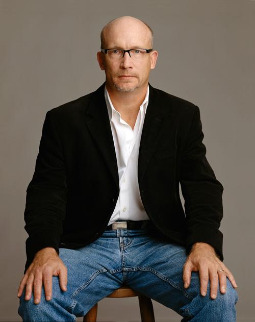 A person in a black blazer and jeans
AI-generated content may be incorrect.