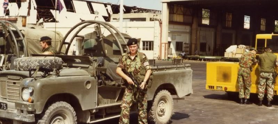A person in military uniform holding an object
AI-generated content may be incorrect.