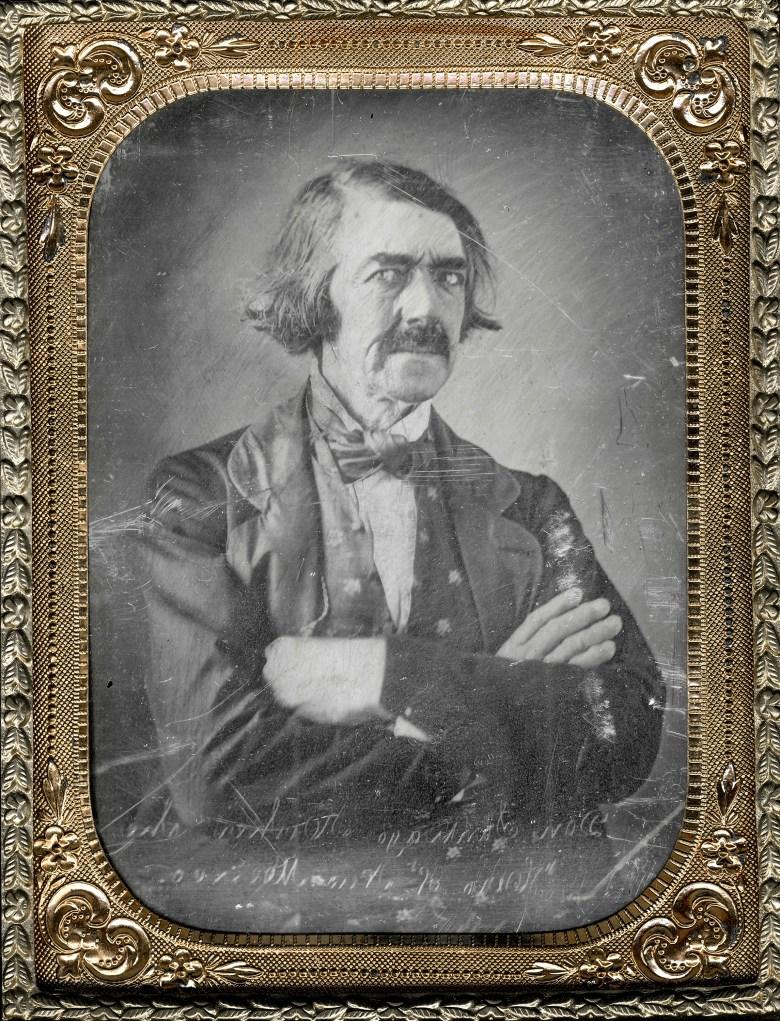 A person with his arms crossed

AI-generated content may be incorrect.