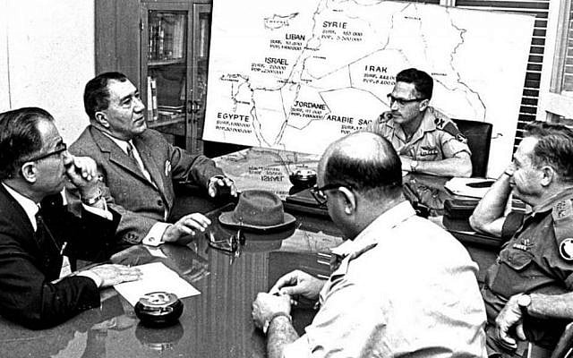 Top Iranian military officials Hasan Toofanian and Bahram Ariana meet with Israeli officers in the headquarters of the Israel Defense Forces, 1975 ((Photo credit: public domain, Wikimedia commons)