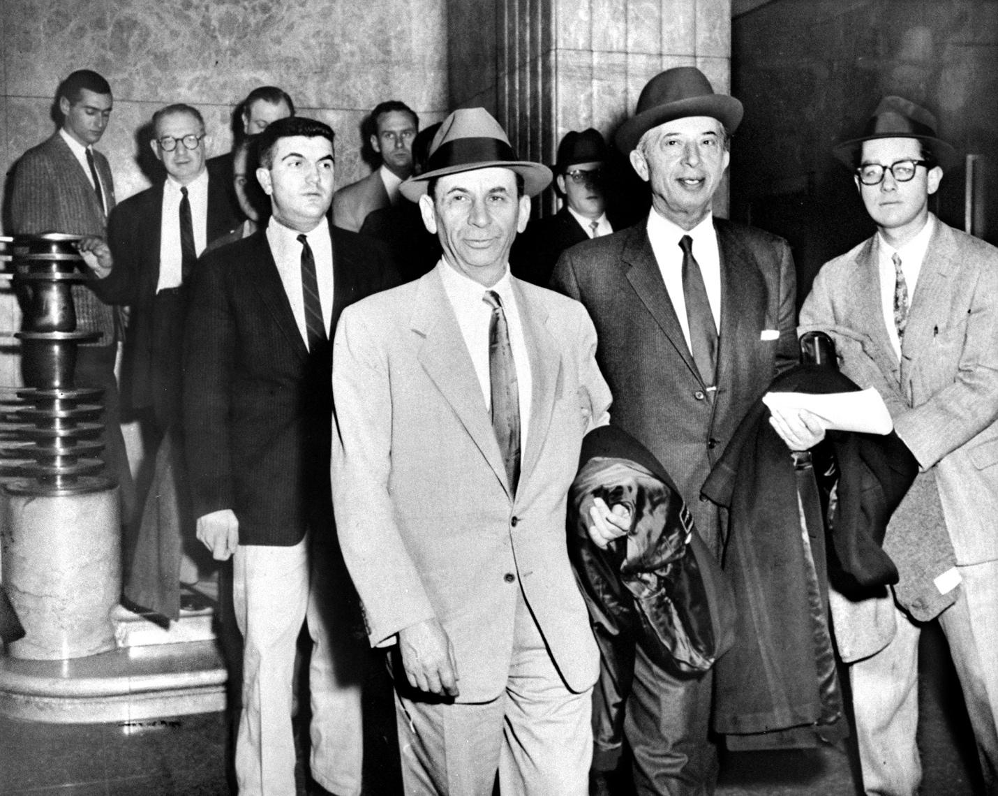 A group of men in suits and ties

AI-generated content may be incorrect.