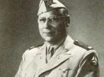 A person in a military uniform<br><br>AI-generated content may be incorrect.