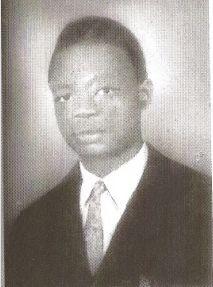 A person in a suit and tie

AI-generated content may be incorrect.