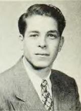 A person in a suit and tie

Description automatically generated