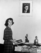 A person standing in front of a picture of a person
AI-generated content may be incorrect.