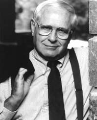 A person wearing glasses and a tie
AI-generated content may be incorrect.