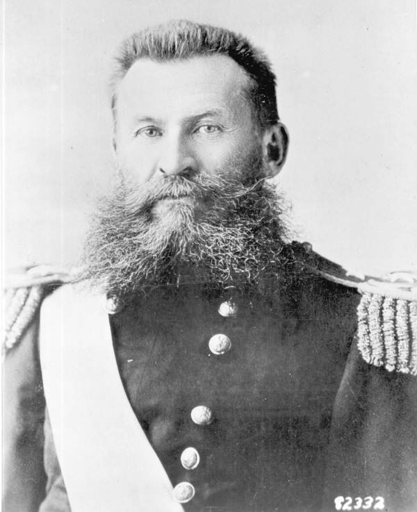 A person with a beard in a military uniform
AI-generated content may be incorrect.