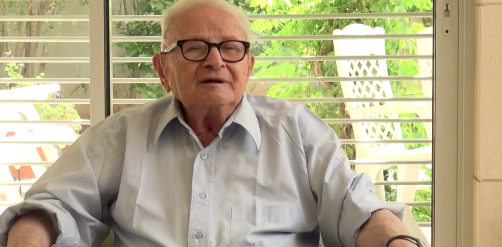 An old person sitting in a chair

AI-generated content may be incorrect.