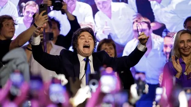 Argentina's President Javier Milei celebrates after the La Libertad Avanza party won the mid-term election, in Buenos Aires on October 26, 2025. The LLA won 64 of the 127 lower house seats and 14 of the 24 Senate seats that were up for grabs.