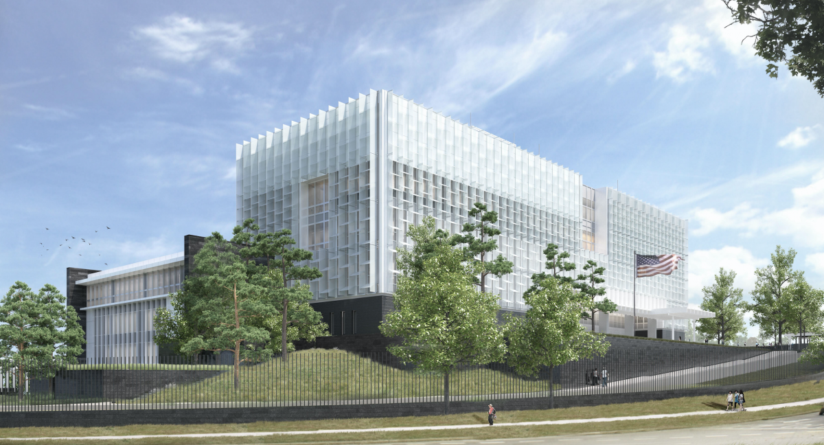 A building with trees and a fence
AI-generated content may be incorrect.