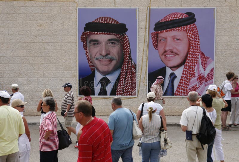 A group of people looking at pictures of a person

AI-generated content may be incorrect.