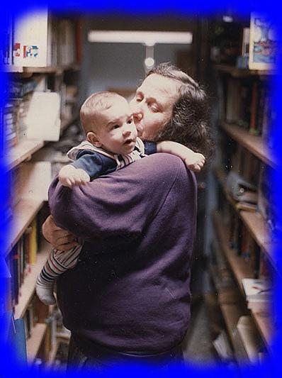 A person holding a baby

AI-generated content may be incorrect.